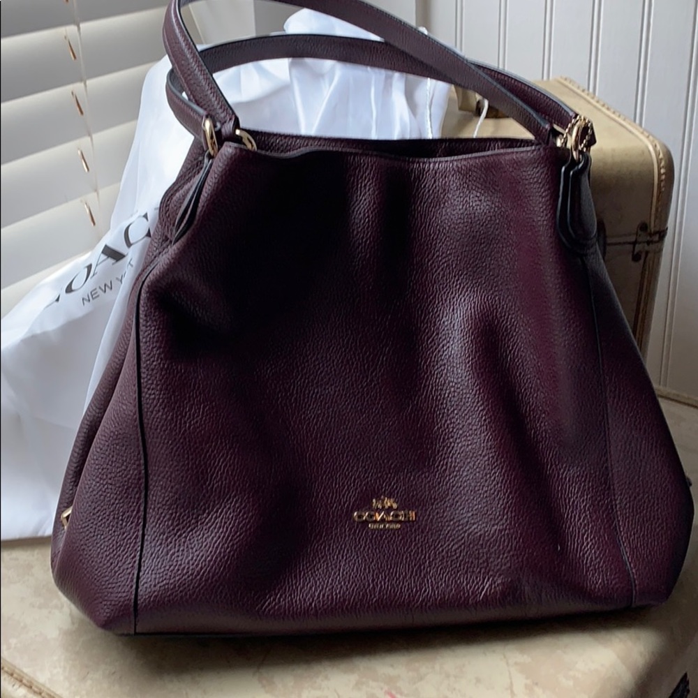 Coach wine colored purse